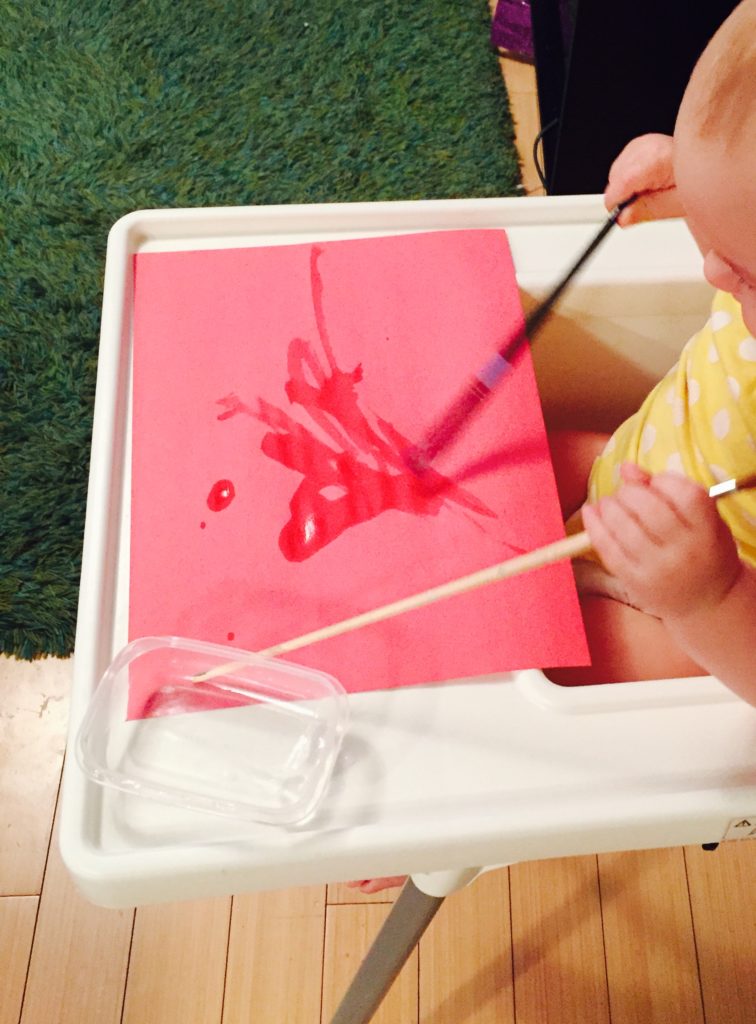 Painting with water, 20 activities for 12-18 months old, 20 play ideas for toddlers, activities for one year old, montessori activities for a toddler, development promoting activities for toddlers, activities for 13 month old, activities for 14 month old, activities for 15 month old, activities for 16 month old, activities for 17 month old, activities for 18 month old, activities for a toddler, activities for one year olds, activities for two year olds