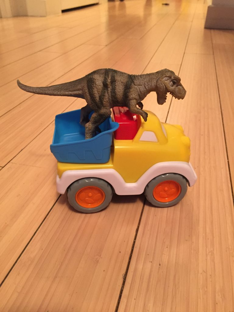 Sending dino for a ride, Saturday box of activities, activities for one year old, activities for toddlers, activities for 12 month old, activities for 13 month old, activities for 14 month old, activities for 15 month old, activities for 16 month old, activities for 17 month old, activities for 18 month old