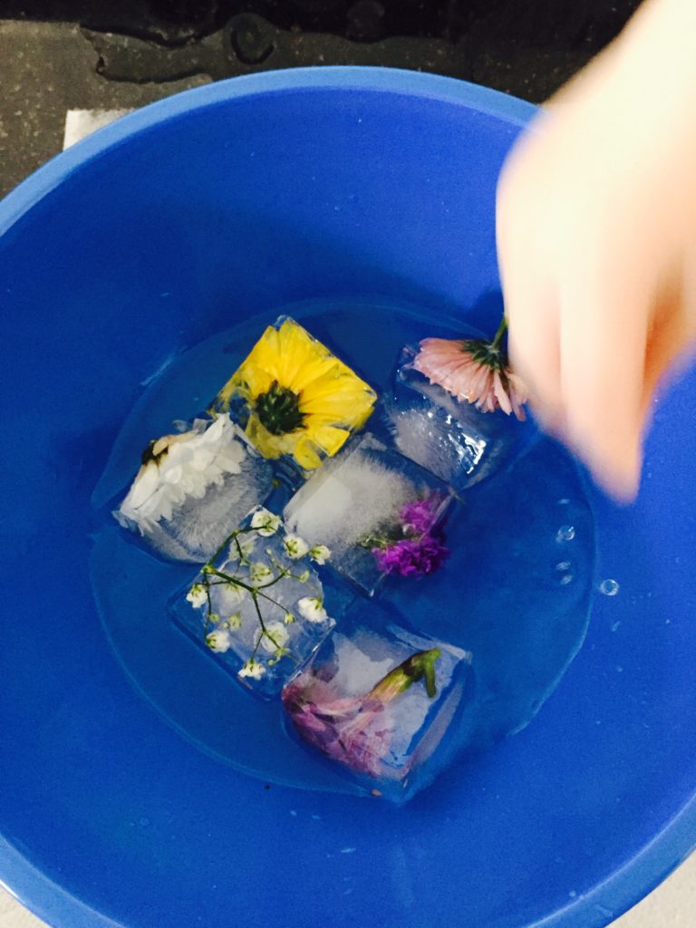 Sensory play with frozen flowers, sensory activities for toddlers, sensory activities, creative activities for toddlers, fun toddler activities, activities for one year olds, activities for two year olds, activities for three year olds, things to do with toddlers, indoor toddler activities