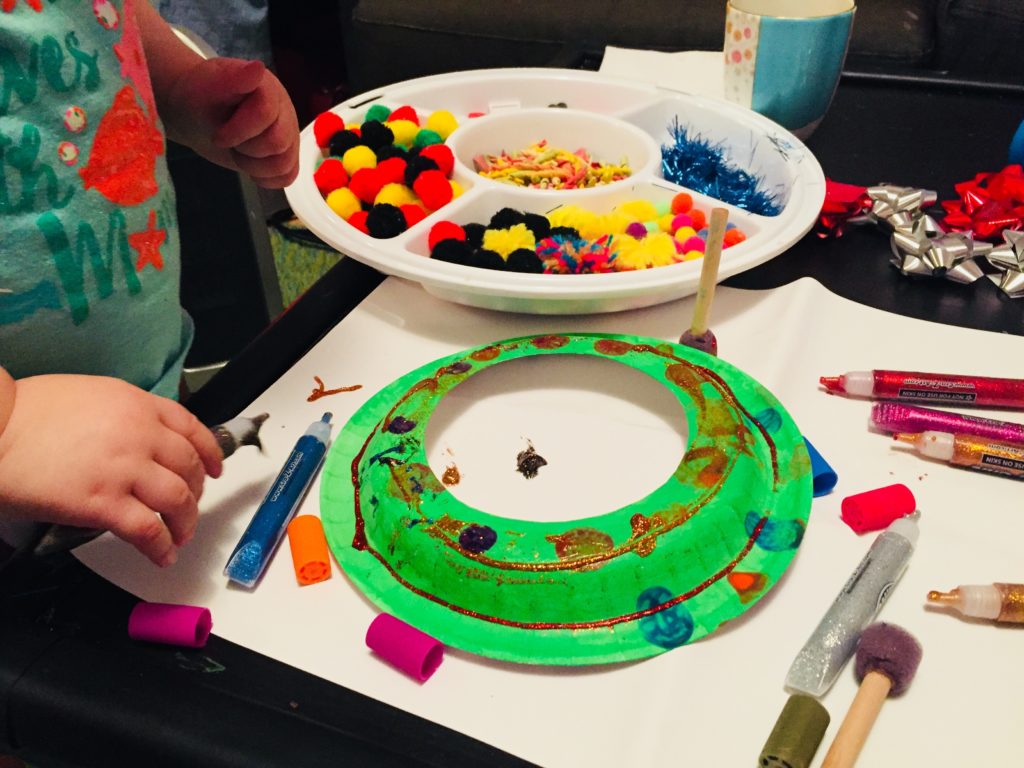 Toddler made Christmas wreath, paper plate Christmas wreath, 24 christmas activities, winter activities, 24 christmas activities for toddlers, winter activities for toddlers, advent calendar activities, christmas activities for 2 year olds, christmas activities for 3 year olds