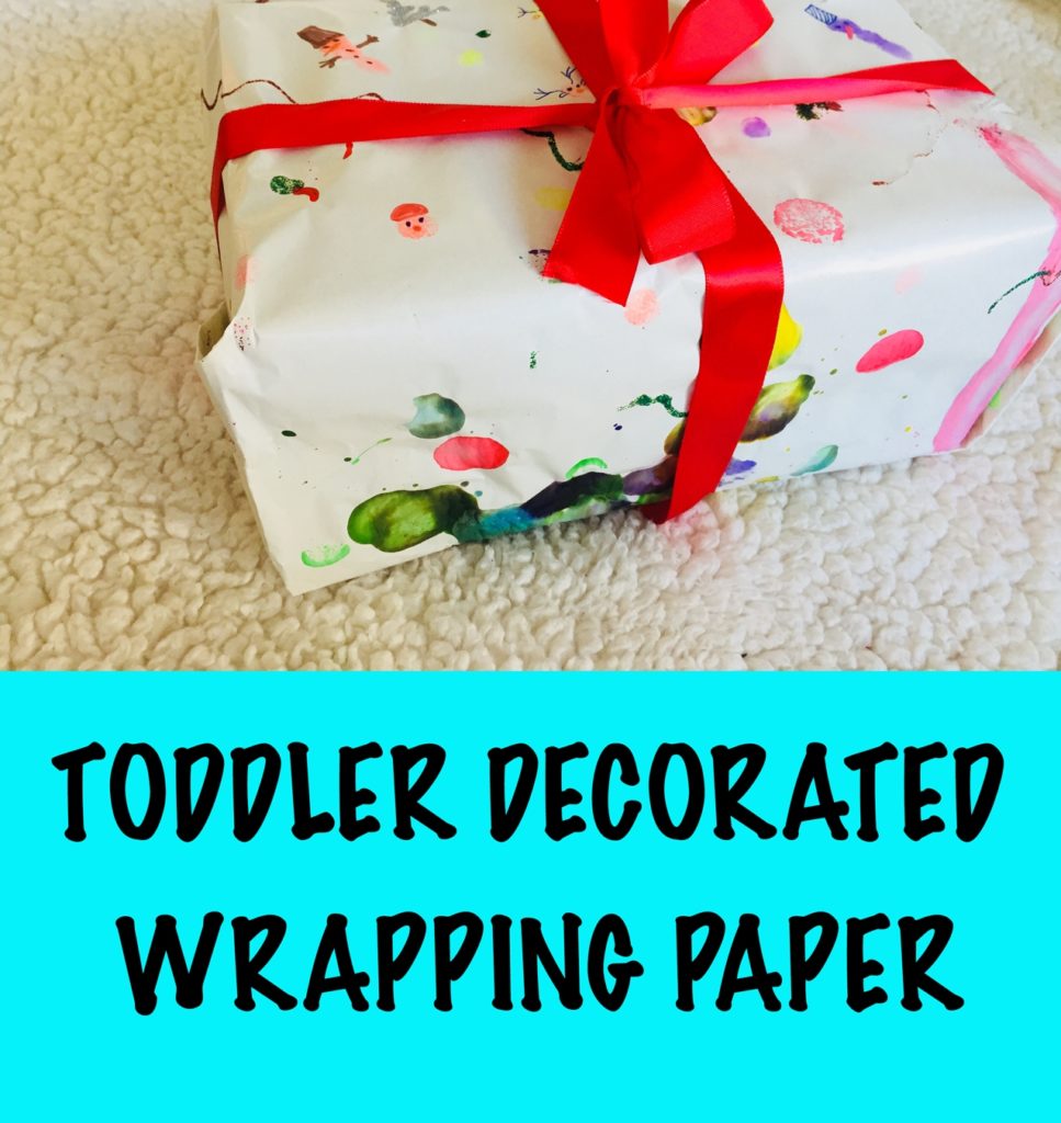 Toddler decorated wrapping paper, toddler made wrapping paper, wrapping paper craft for toddlers, 24 christmas activities, winter activities, 24 christmas activities for toddlers, winter activities for toddlers, advent calendar activities, christmas activities for 2 year olds, christmas activities for 3 year olds, toddler crafts, toddler christmas crafts, christmas crafts for toddlers, christmas crafts for two year olds, christmas crafts for three year olds