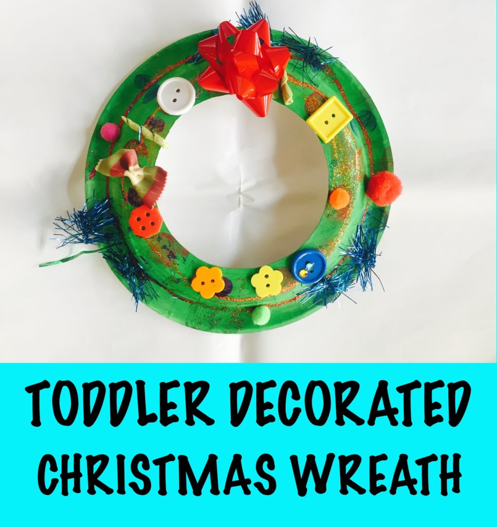 Paper plate christmas wreath, toddler decorated christmas wreath, 24 christmas activities, winter activities, 24 christmas activities for toddlers, winter activities for toddlers, advent calendar activities, christmas activities for 2 year olds, christmas activities for 3 year olds, toddler crafts, toddler christmas crafts, christmas crafts for toddlers, christmas crafts for two year olds, christmas crafts for three year olds