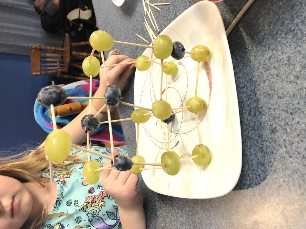 Building structures with grapes, blueberries and toothpicks