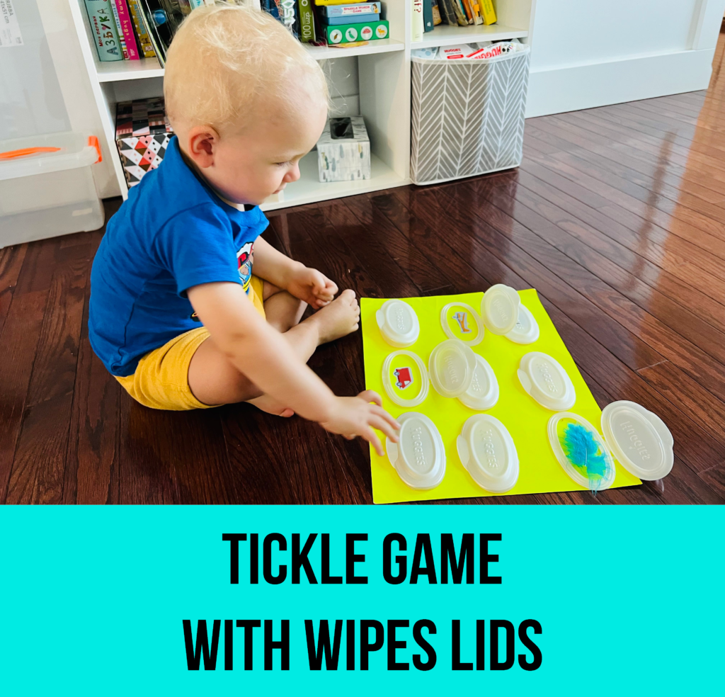 activities for one year olds, games for one year olds, games for toddlers, things to do with one year olds, activities for 18 month olds, activities for 1.5 year olds, things to do with toddlers, activities for 16 month olds, activities for 2 year olds, tickle game, wipes lids crafts, wipes lids ideas, wipes lids diy